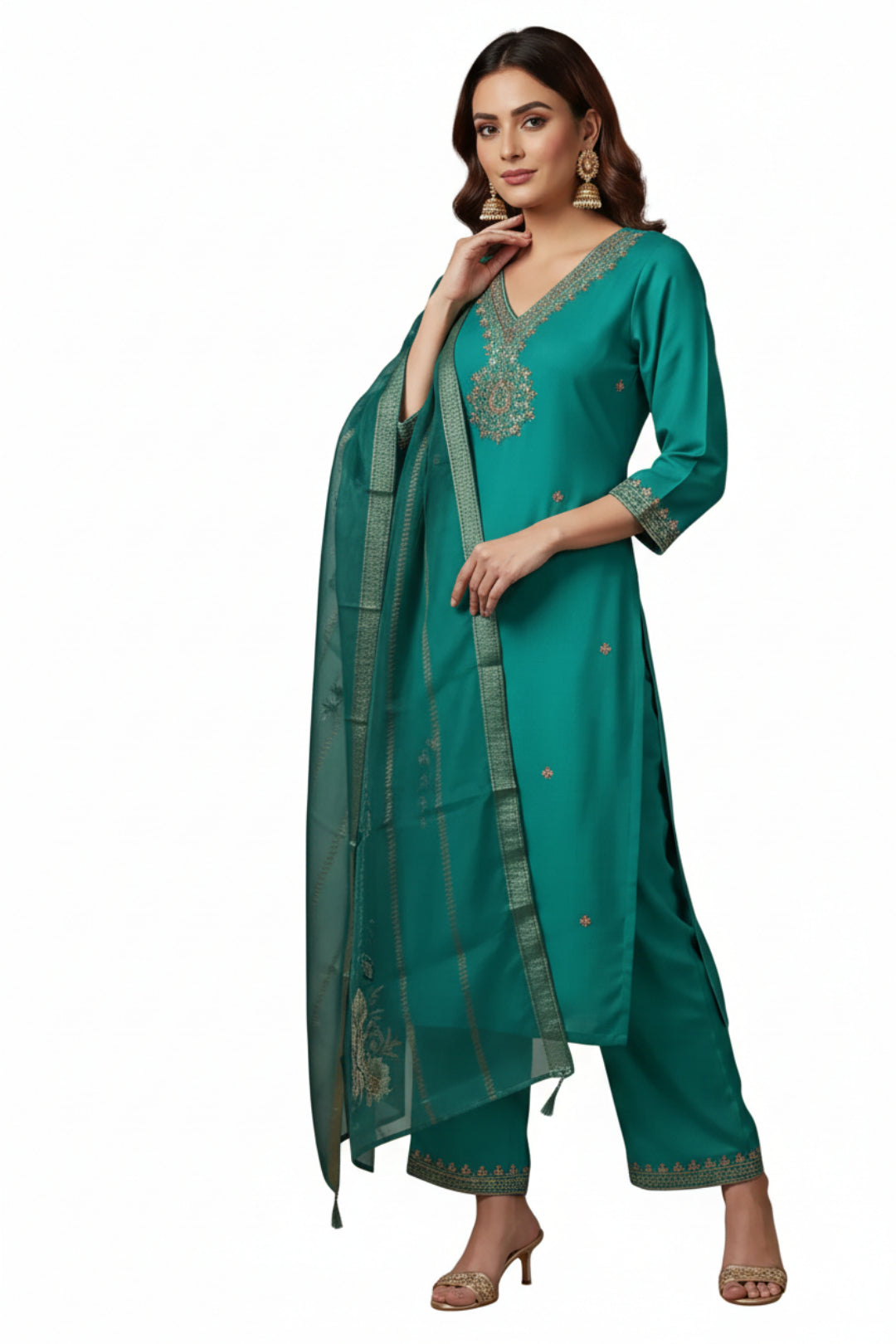 Woman wearing a teal traditional outfit with a white background