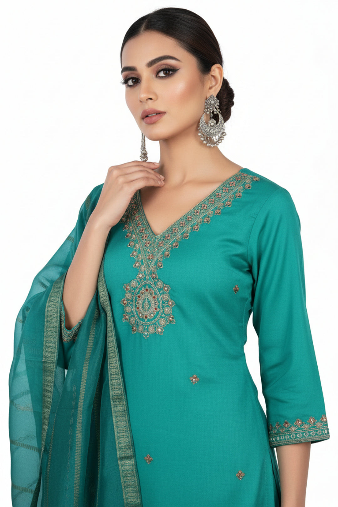Teal traditional outfit with matching dupatta on a hanger against a white background