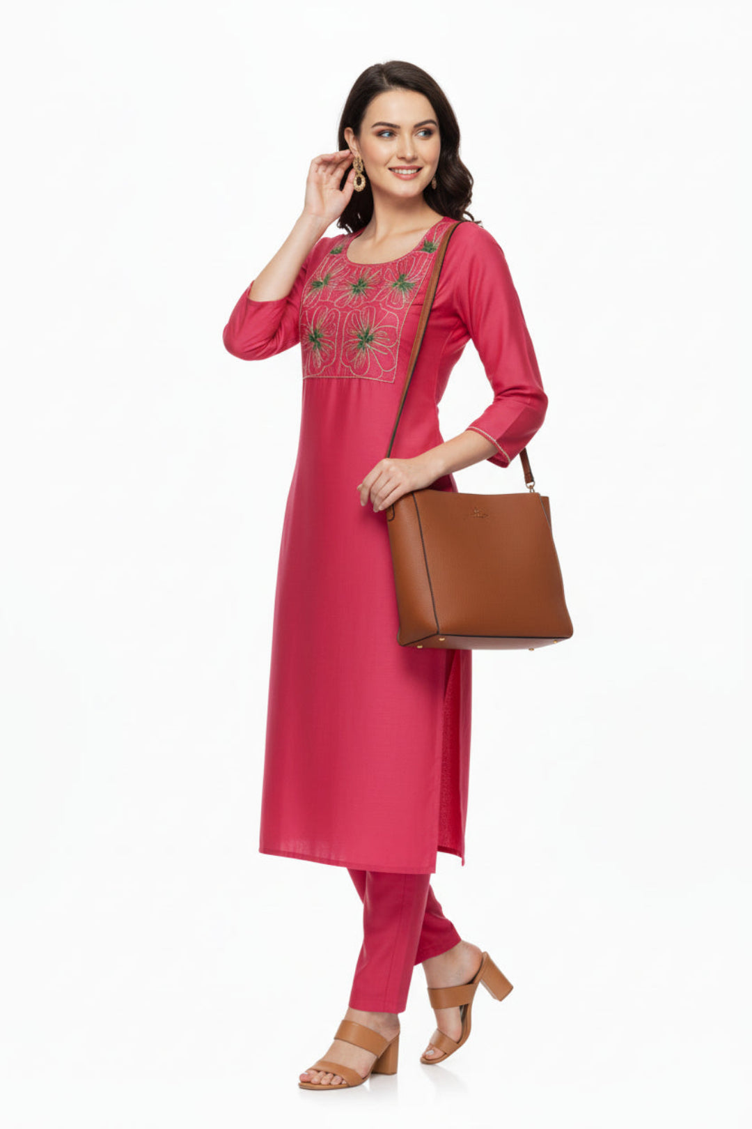 pink kurta with floral embroidery on a white background