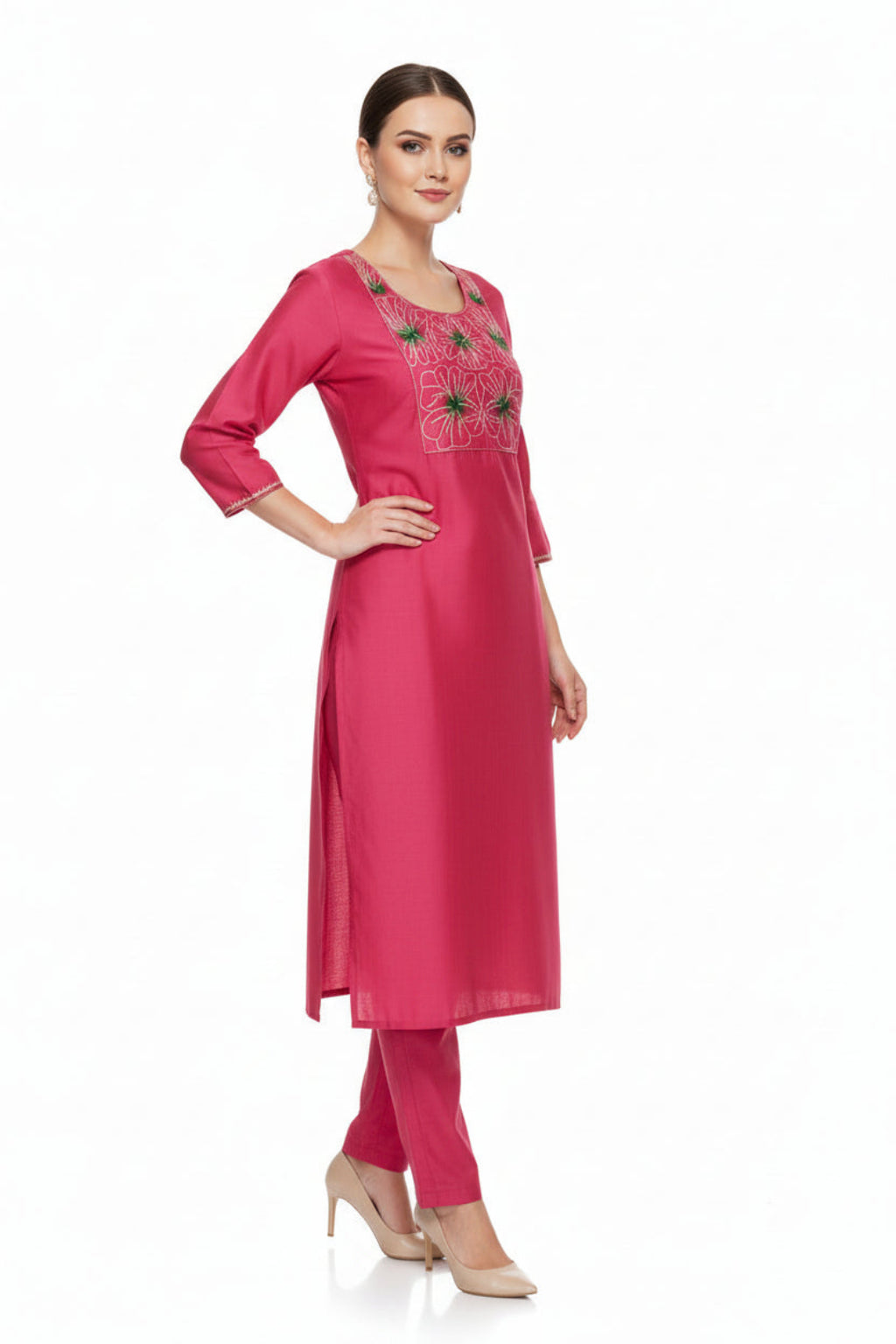 Woman wearing a pink kurta with embroidery on a white background