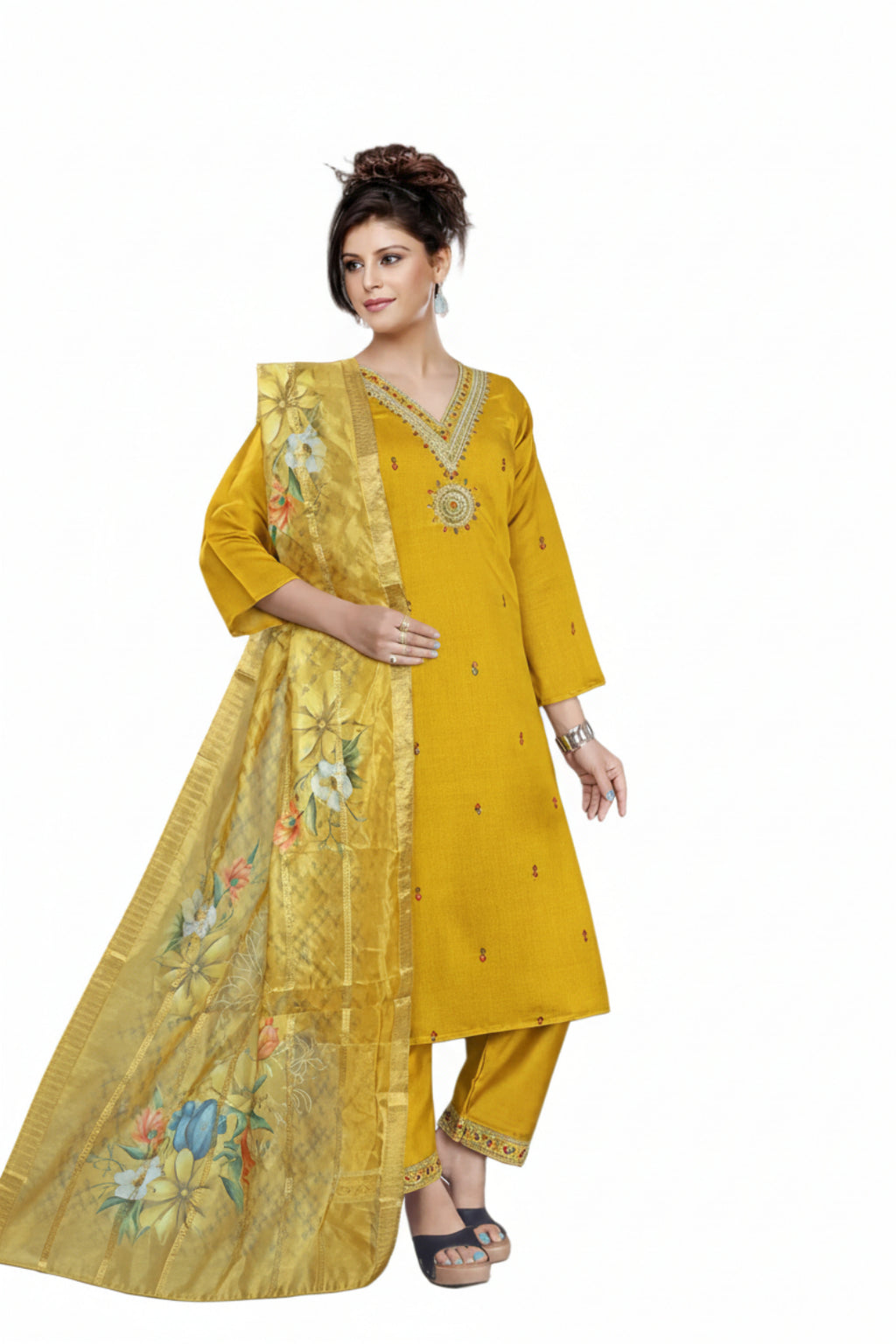 Woman wearing a yellow traditional outfit with floral embroidery in two different poses.