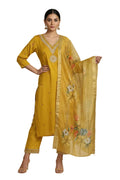 Yellow traditional outfit with floral embroidery on a white background