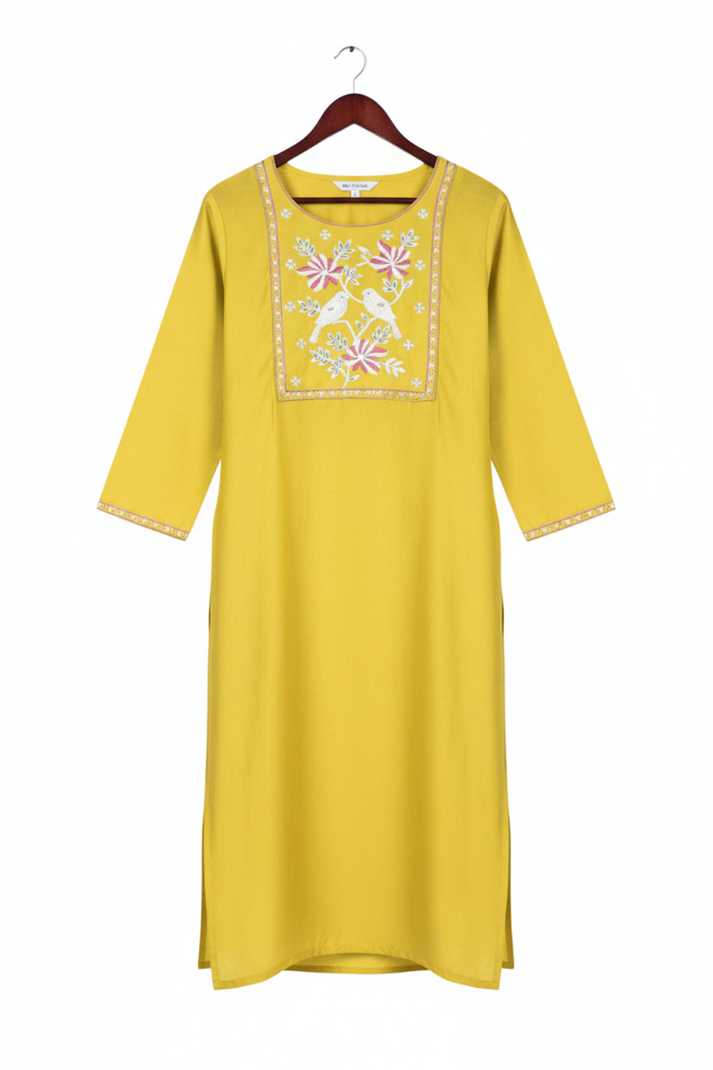 Two women wearing yellow embroidered kurtis on a white background