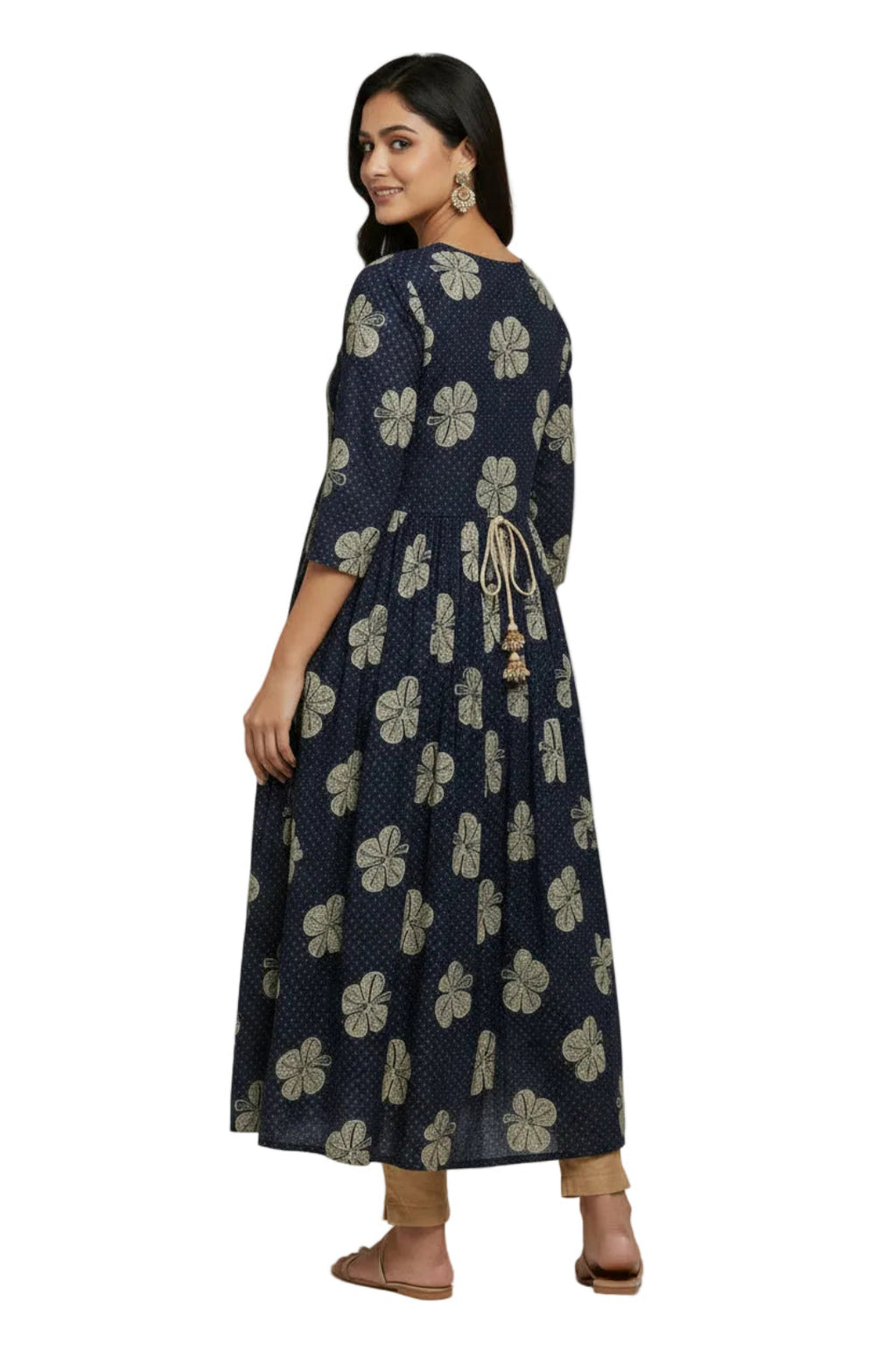 Navy blue dress with gold floral patterns on a white background