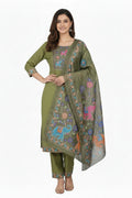 Green embroidered outfit with matching dupatta on hangers against a white background