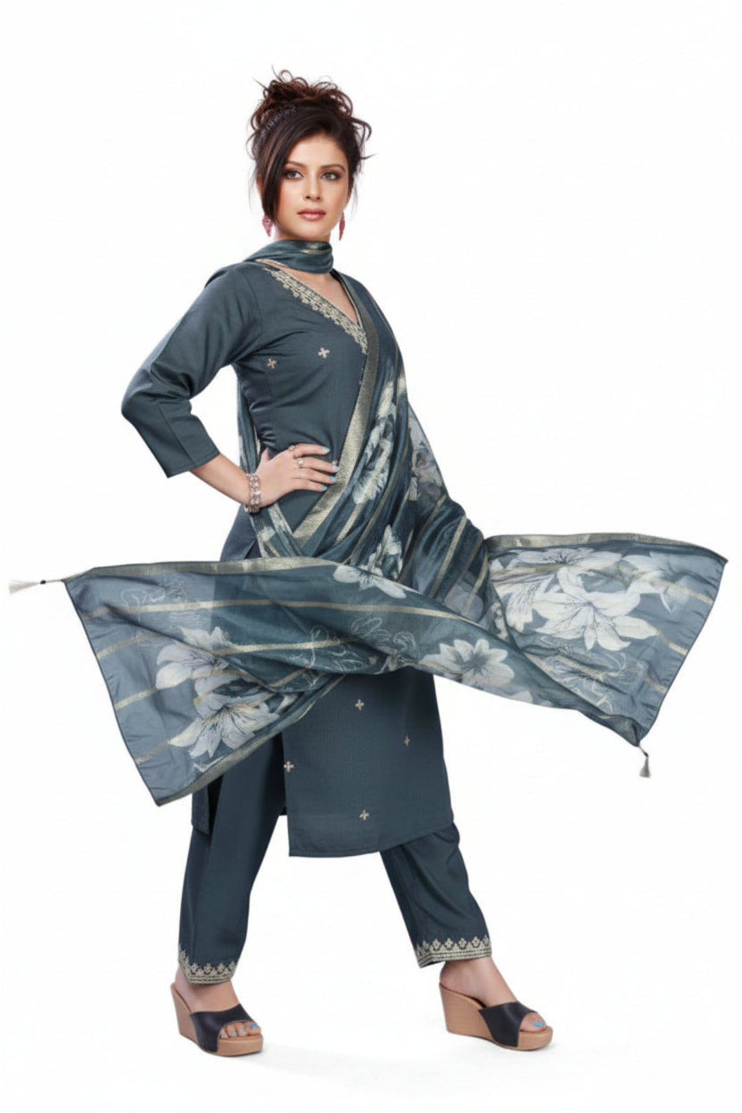 Woman wearing a dark blue embroidered outfit with a digital dupatta, brand 'Himani' visible.