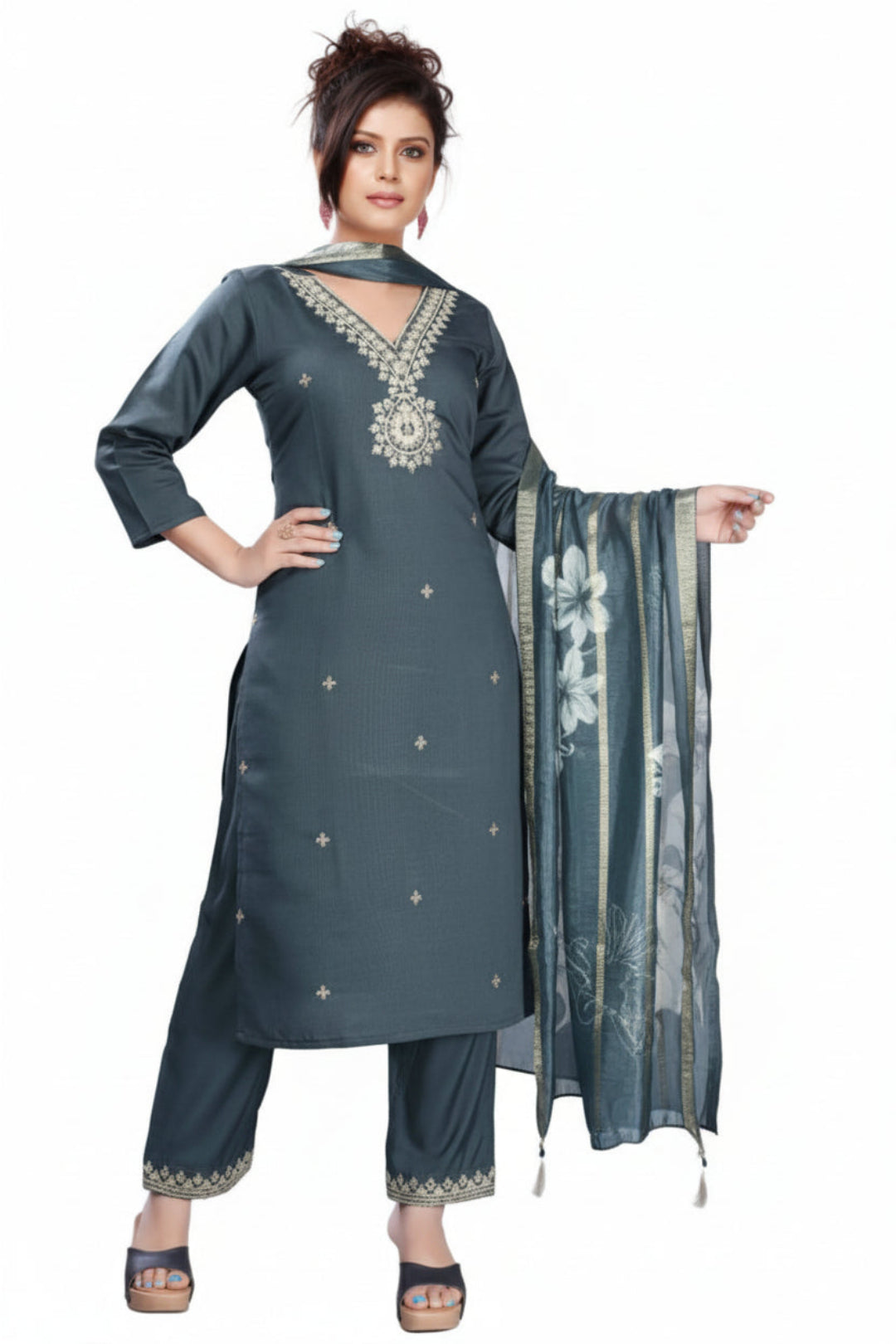 Woman wearing a gray traditional outfit with a floral dupatta on a white background