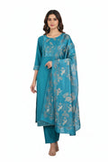 Teal embroidered outfit with matching dupatta on a hanger against a white background