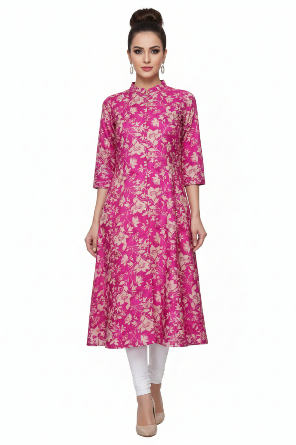 Pink floral dress on a hanger against a white background