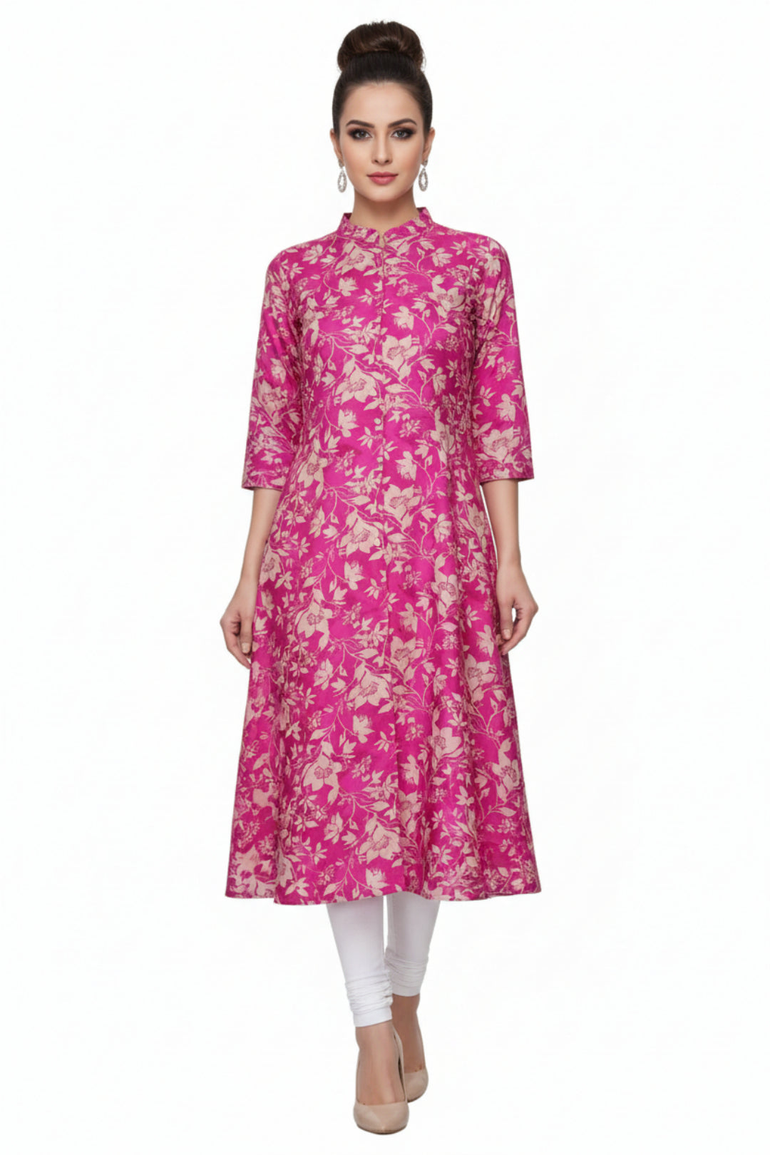 Pink floral dress on a hanger against a white background