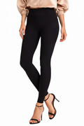 Person wearing black leggings and high-heeled shoes on a white background