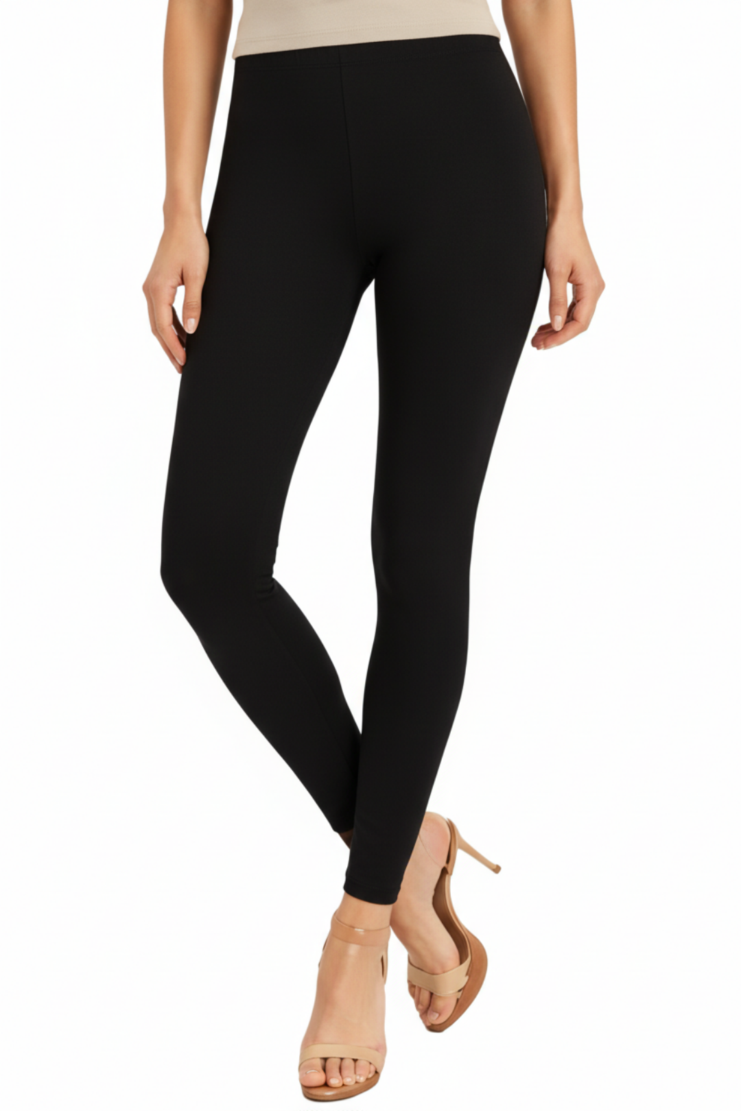 Black leggings worn by a person on a white background
