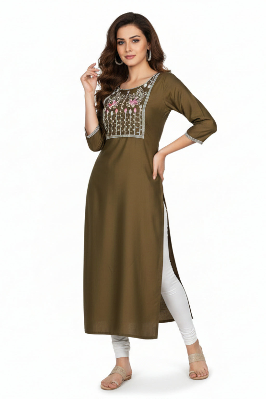 Woman wearing a brown kurta with white embroidery on a white background