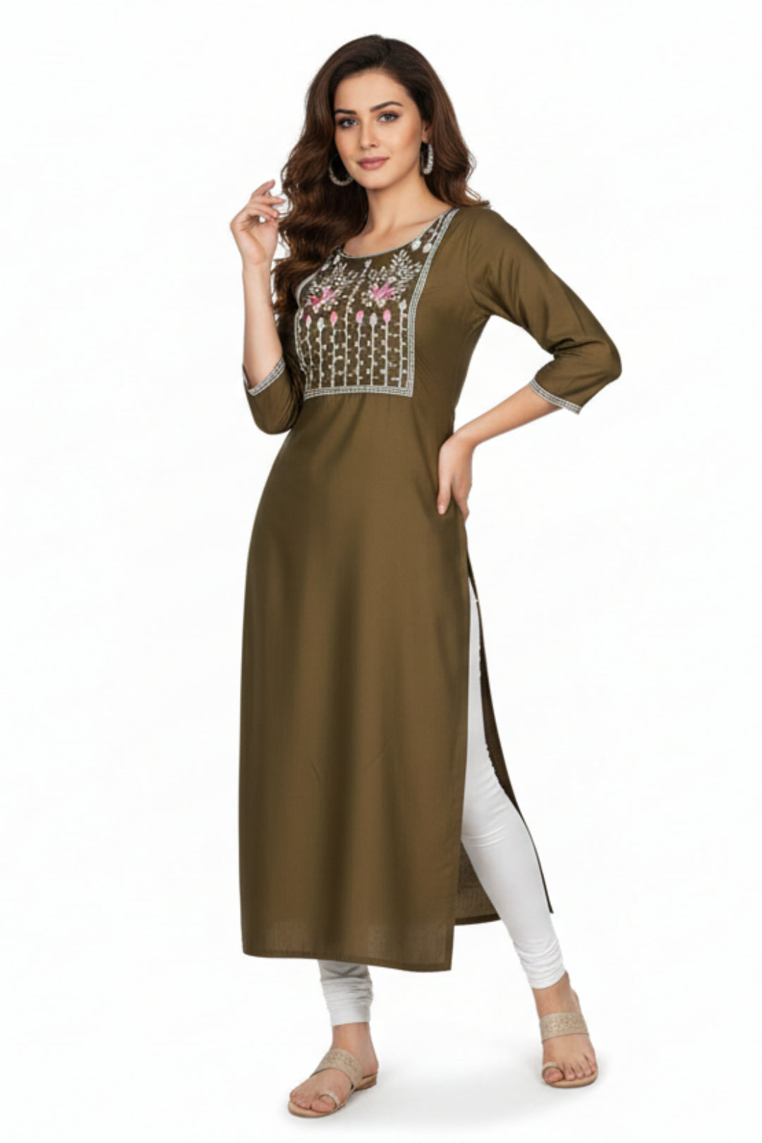Woman wearing a brown kurta with white embroidery on a white background