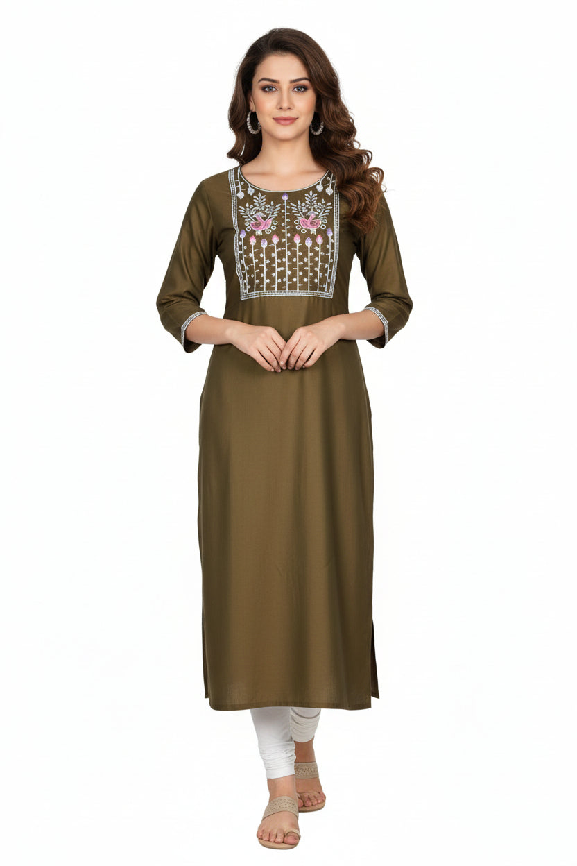 Woman wearing a brown kurta with white embroidery on a white background