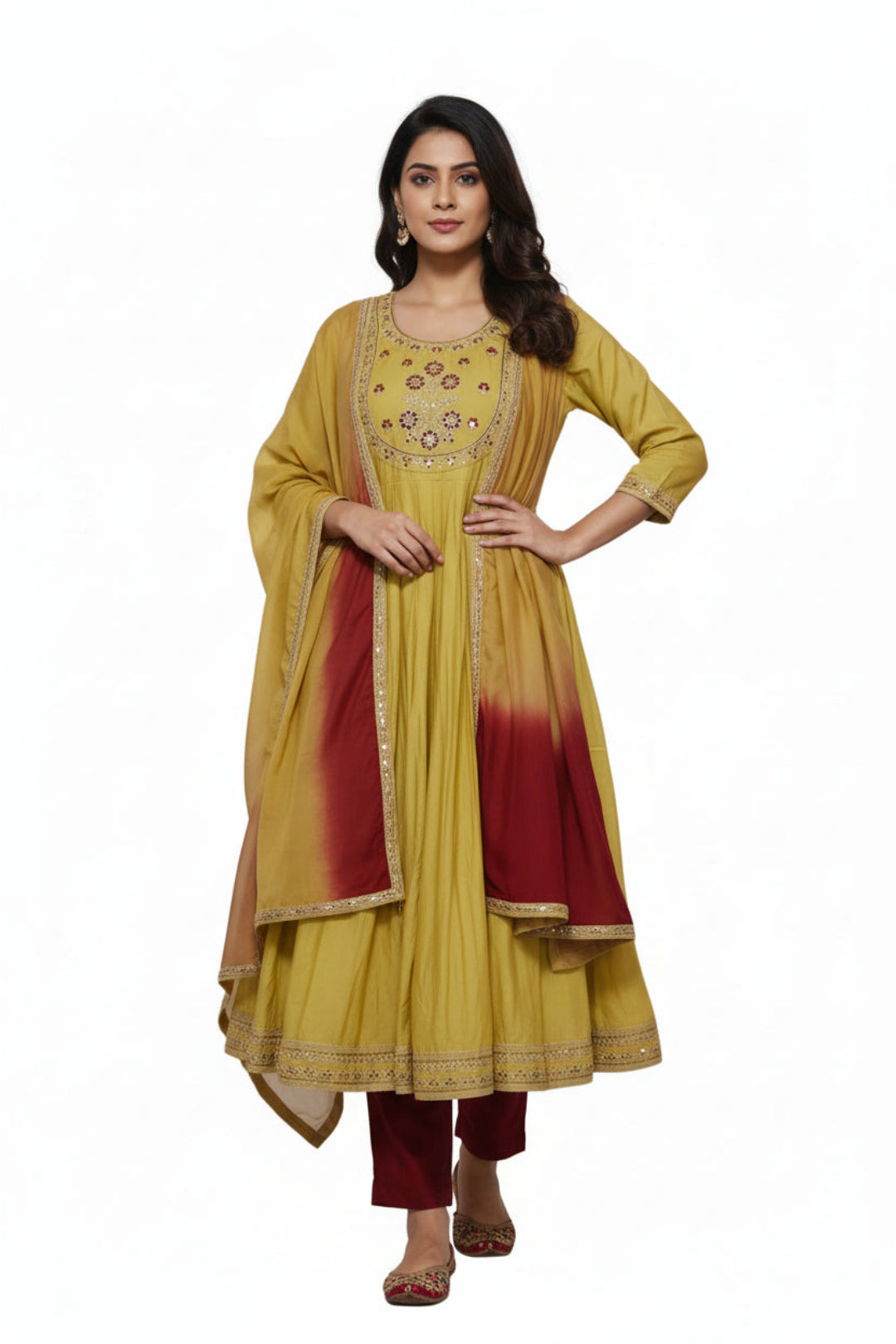 Yellow embroidered dress with a red scarf on a white background